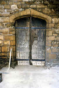 Conservation of 15th century doors to old Bishop's Palace